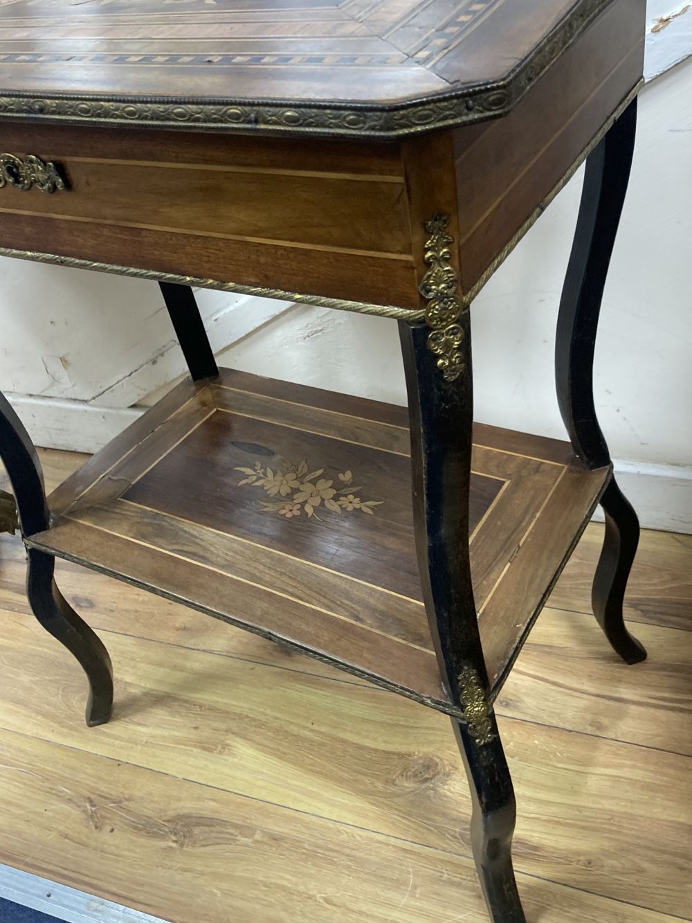 A French marquetry inlaid kingwood and walnut two tier work table, width 57cm, depth 39cm, height 74cm